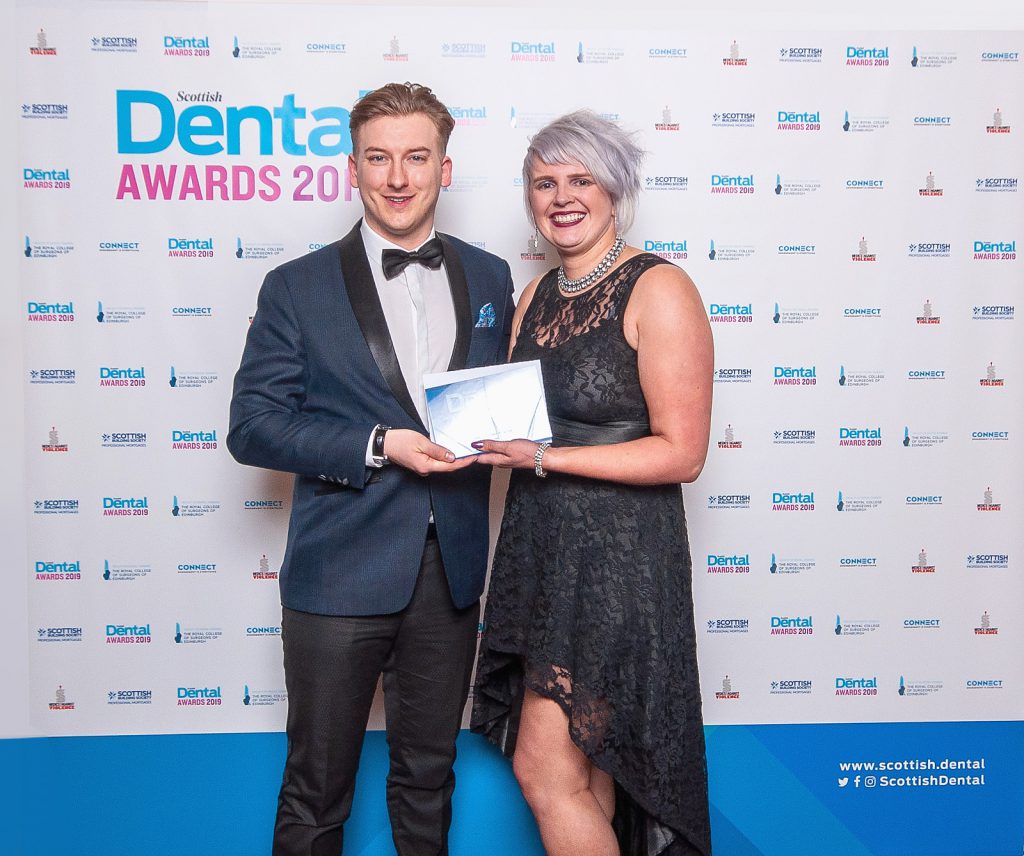 Louise with presenter Adam Stokes from Acteon Group